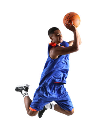 Jumping African-American basketball player on white backgroundの写真素材