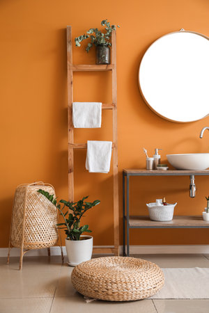 Stylish interior of modern bathroom with clean towelsの写真素材