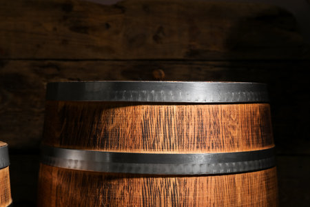 Oak barrel on wooden background, closeupの写真素材