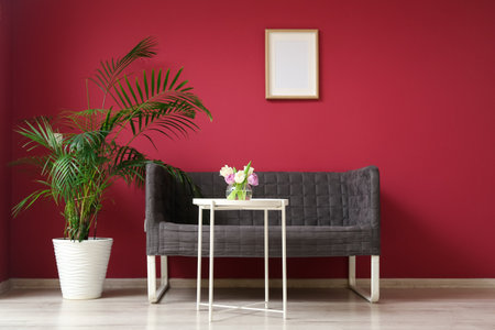 Interior of living room with black sofa and tableの写真素材