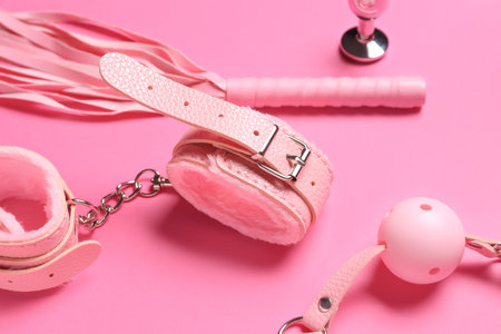 Different sex toys on pink background, closeupの写真素材