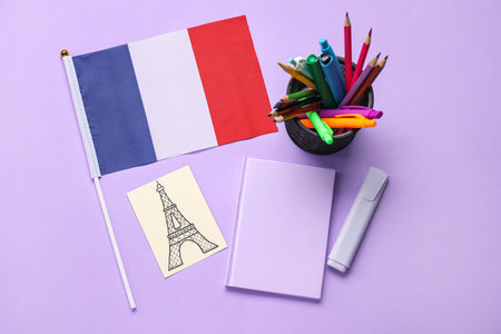 Flag of France with stationery and drawn Eiffel Tower on lilac backgroundの写真素材