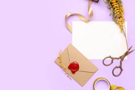 Composition with blank card, envelope, scissors and mimosa flowers on color backgroundの写真素材