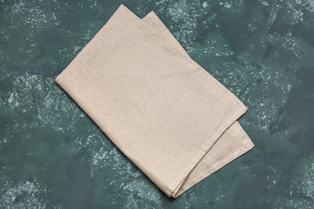 Folded napkin on dark color backgroundの写真素材