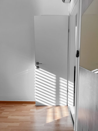 open white door in light room