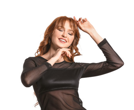 Beautiful young redhead woman on white backgroundの写真素材