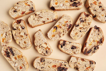 Delicious biscotti cookies on beige backgroundの写真素材