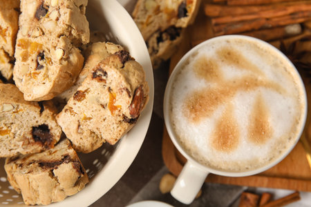 Delicious biscotti cookies and cup of coffee, closeupの写真素材