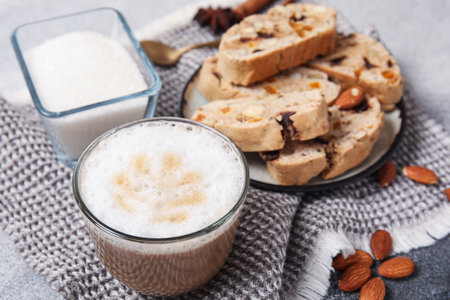 Delicious biscotti cookies and cup of coffee on napkinの写真素材