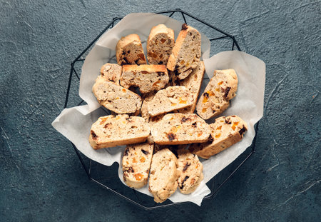 Grid with delicious biscotti cookies on grunge backgroundの写真素材