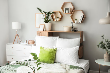 Interior of modern stylish bedroom with shelvesの写真素材