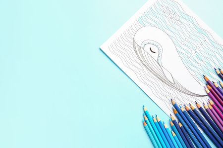 Coloring picture and pencils on color backgroundの写真素材