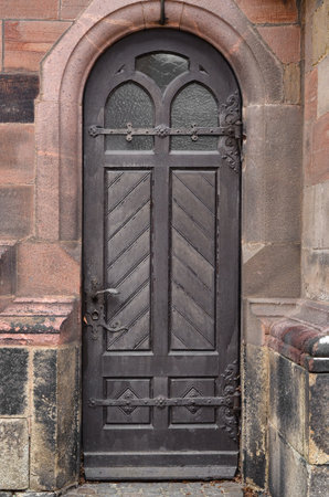 View of old building with wooden doorの写真素材