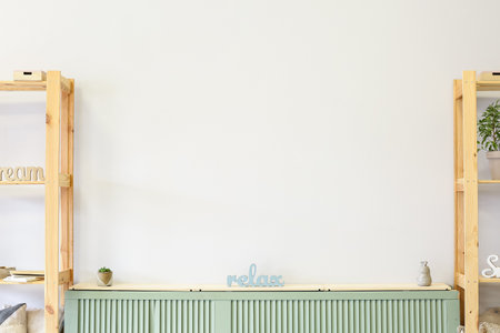 Stylish interior of room with stand and wooden racksの写真素材