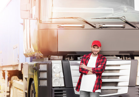 Male driver near big truck outdoorsの写真素材