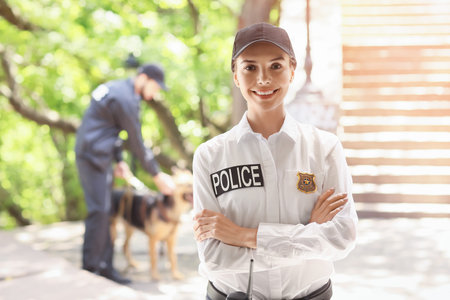 Young female police officer outdoorsの写真素材