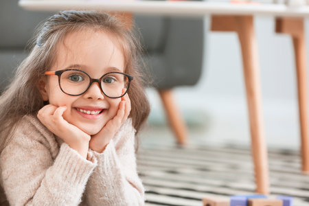 Cute little girl at homeの写真素材