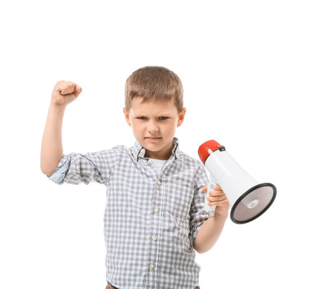 Aggressive little boy with megaphone on white backgroundの写真素材