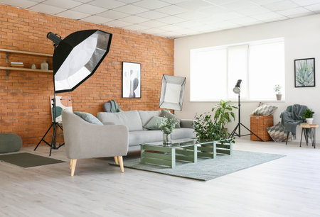 Interior of photo studio with modern equipment and furnitureの写真素材