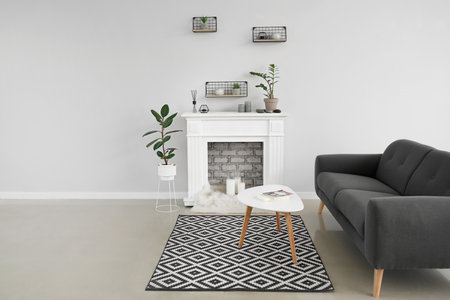 Modern fireplace with shelves in the interior of the roomの写真素材