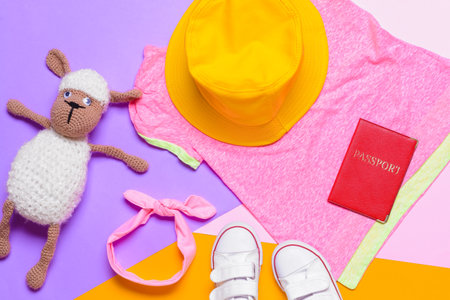Travel accessories for children on color backgroundの写真素材