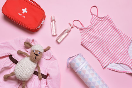 Travel accessories for children on color backgroundの写真素材