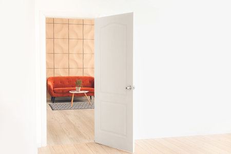 View of living room through open door