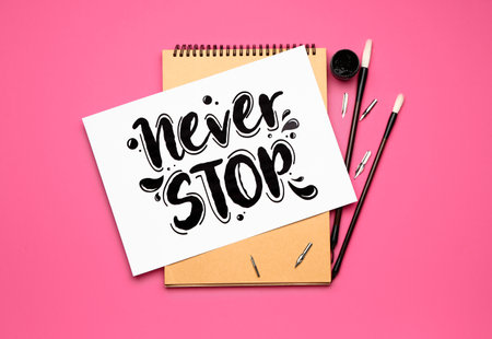 Supplies for calligraphy practice on color backgroundの写真素材