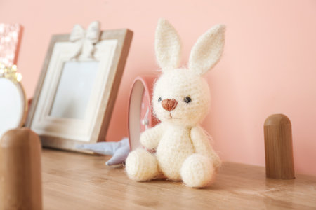 Cuddly toy on shelf in children's roomの写真素材