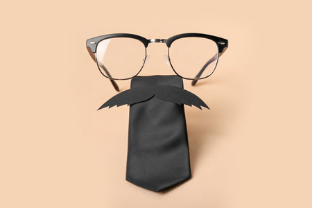 Composition with eyeglasses, paper mustache and tie on color background. father's day celebrationの写真素材