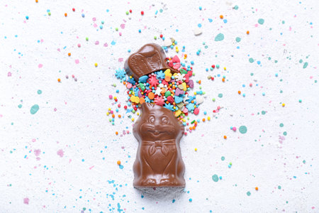 Chocolate Easter bunny with sprinkles on white backgroundの写真素材