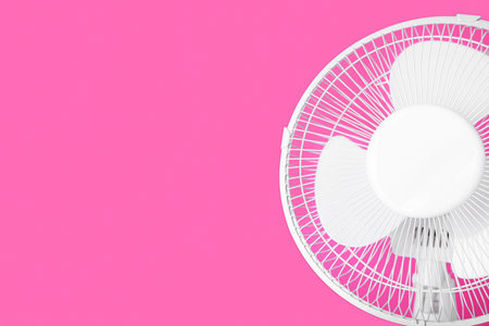 electric fan on pink backgroundの写真素材