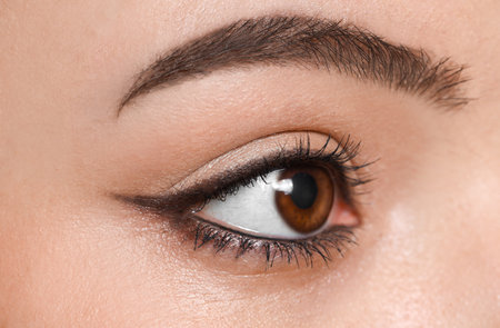 Young woman with brown eyes, close upの写真素材