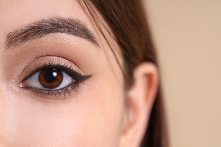 Young woman with brown eyes, close upの写真素材
