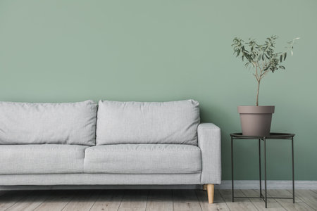 Sofa near wall in interior of living roomの写真素材