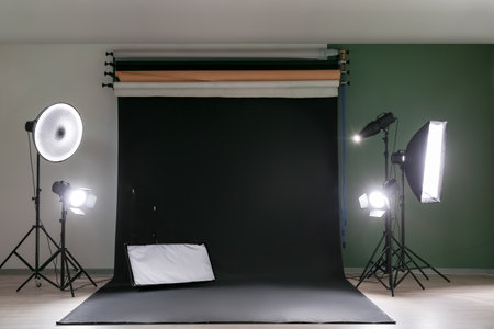Glowing lighting equipment in modern photo studioの写真素材