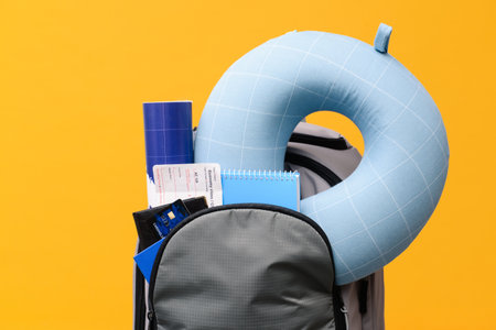 Set of travel accessories on color backgroundの写真素材