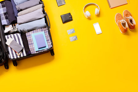 Set of travel accessories on color background