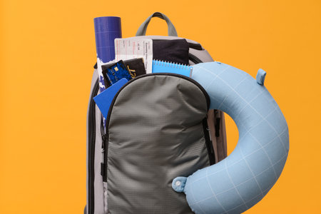 Set of travel accessories on color backgroundの写真素材