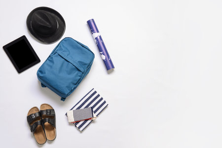 Set of travel accessories on white background