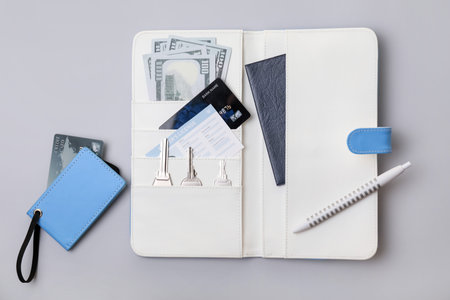 Travel organizer with different things on gray background
