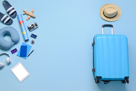 Set of travel accessories on color backgroundの写真素材