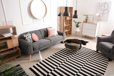 Stylish interior living room with comfortable sofaの写真素材