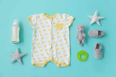 Set of baby accessories on color backgroundの写真素材
