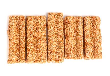 Tasty sesame kozinaki isolated on white backgroundの写真素材