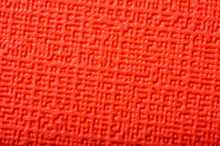 Close up view of coral canvas texture as backgroundの写真素材