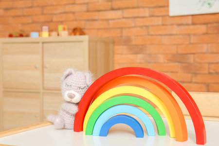 toy rainbow and bear in kindergartenの写真素材