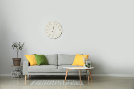 Interior of modern room with comfortable sofa