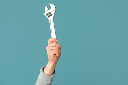 Worker wrench on blue backgroundの写真素材