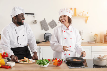 African-American chefs cooking in the kitchenの写真素材